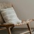 a chair with a pillow
