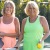 two women playing Pickleball