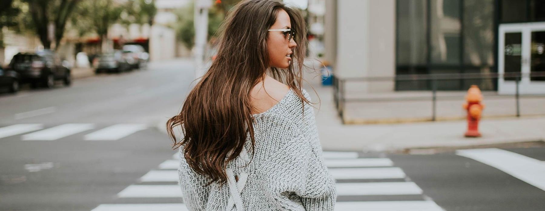 a person walking in a crosswalk